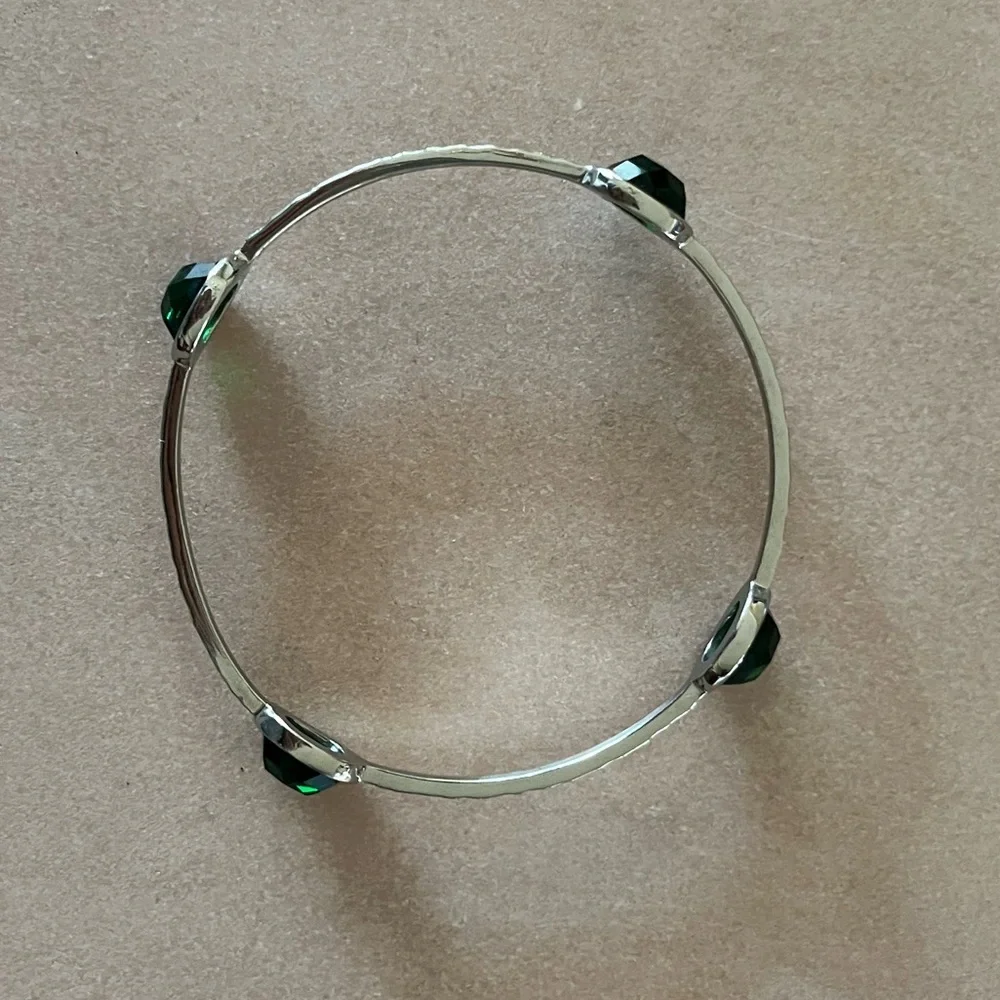 Silver Hammered Bangle Bracelet with Green Faceted Stones